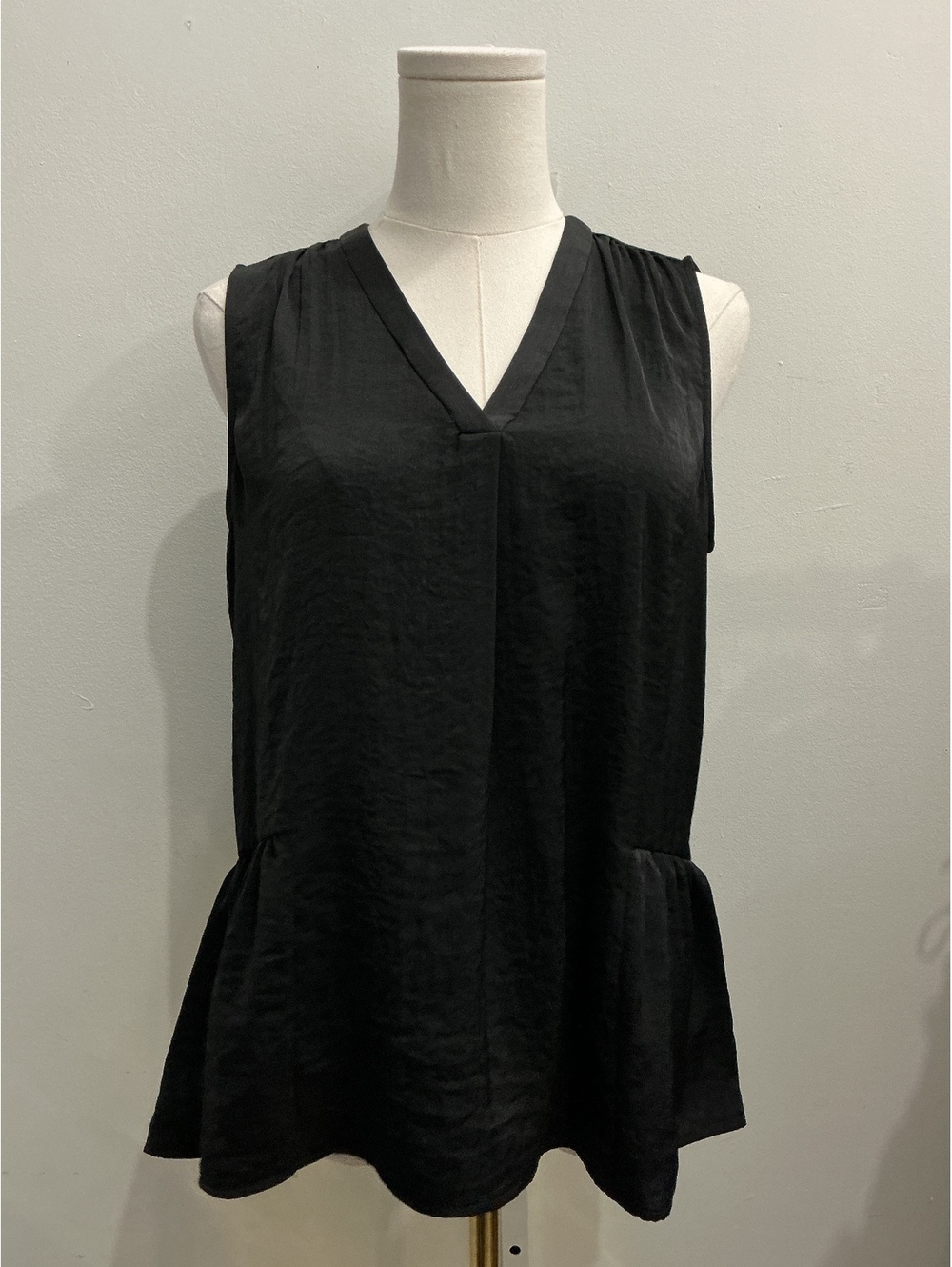 Vince Camuto Black Sleeveless v-neck Peplum Top with ruffle accent